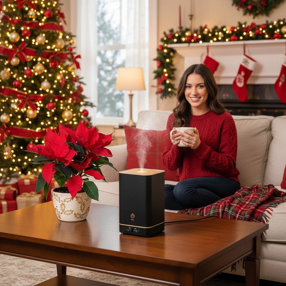 Red poinsettia plant on a coffee table in a festive living room with Christmas décor.